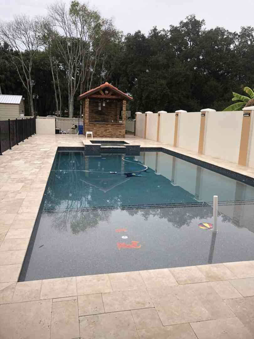 A rectangular pool with floor designs