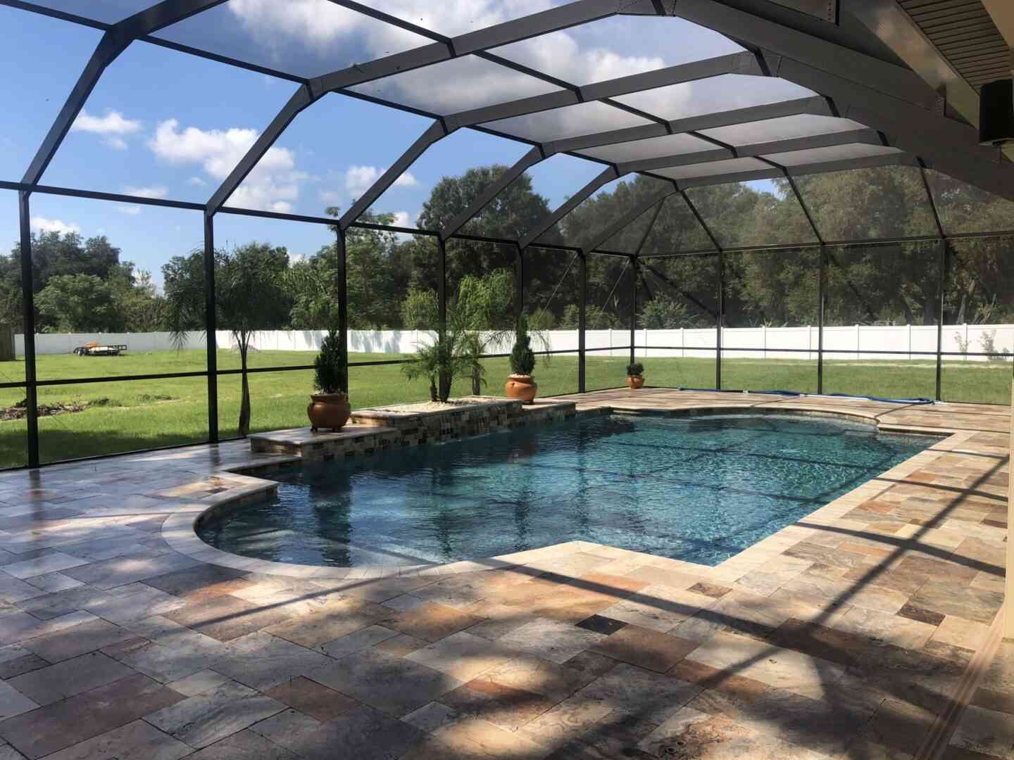 A pool with a sun roof